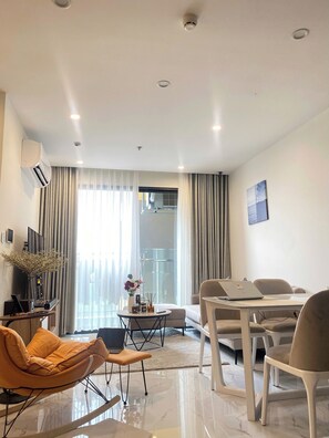 Luxury Double or Twin Room, 2 Bedrooms, River View | Living area | 65-inch Smart TV with digital channels - LA Nest  (Ho Chi Minh City)