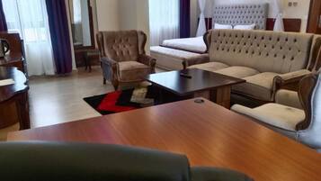 Comfort Suite, Balcony | Living area