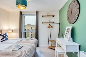 2 bedrooms, desk, iron/ironing board, travel cot