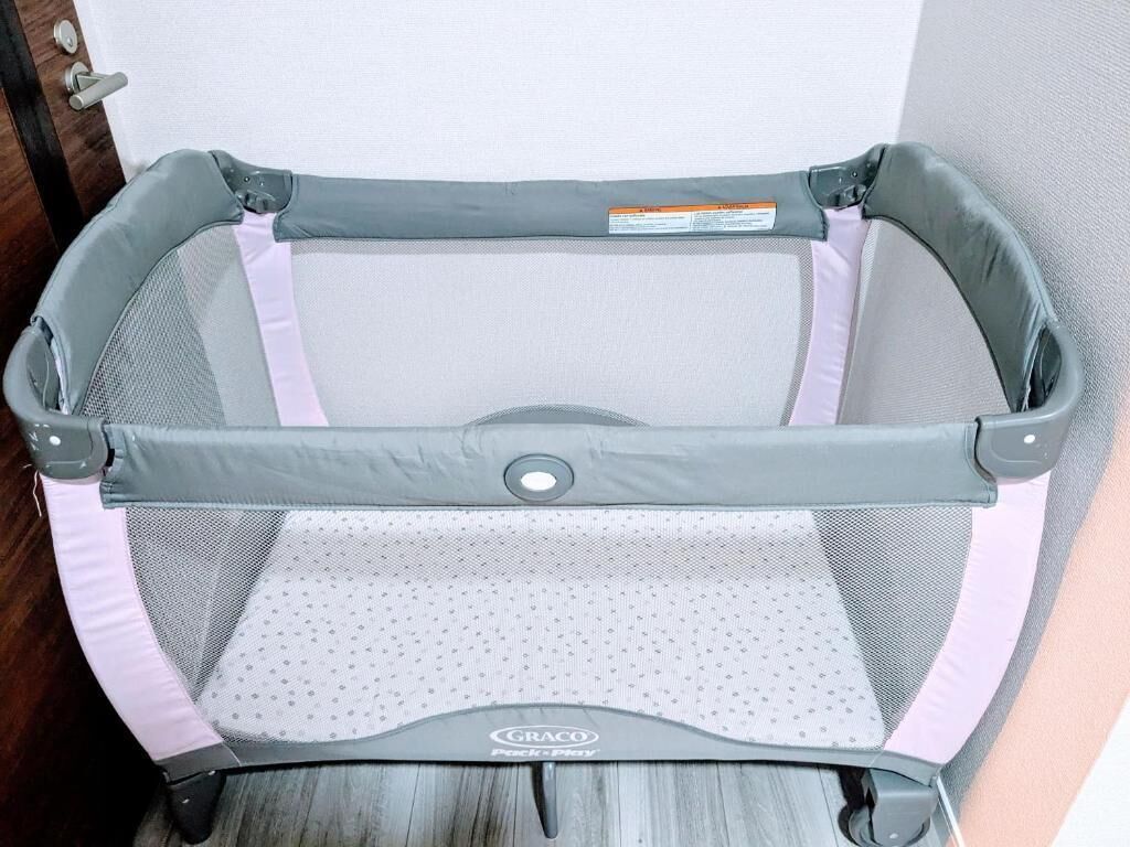 A Graco Pack-n-Car seat with a mesh backrest and a padded seat cushion.