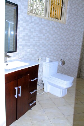 Shower, hair dryer, towels, soap