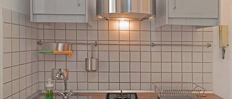 Fridge, stovetop, coffee/tea maker, cookware/dishes/utensils