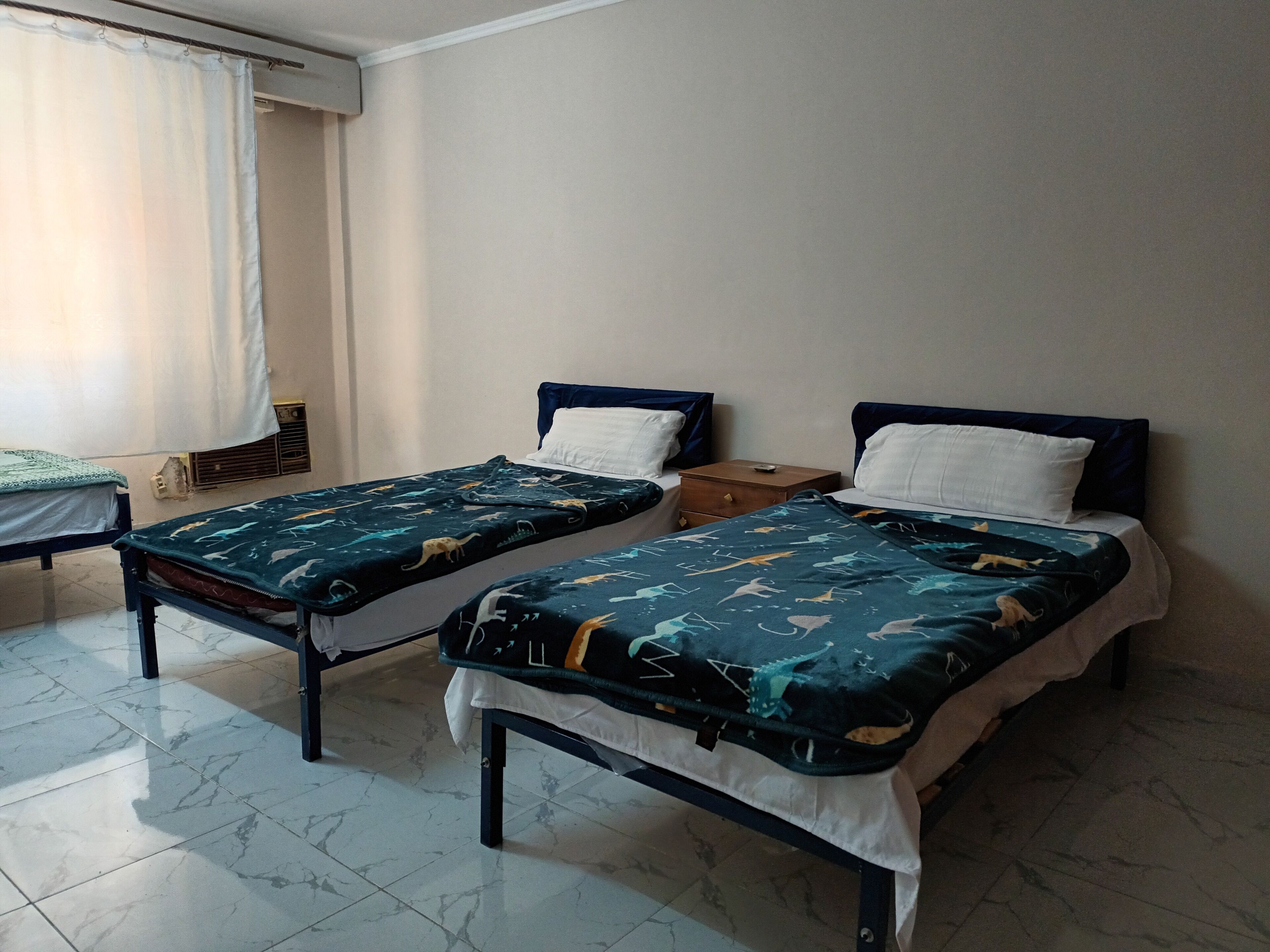 Habitación triple familiar, varias camas