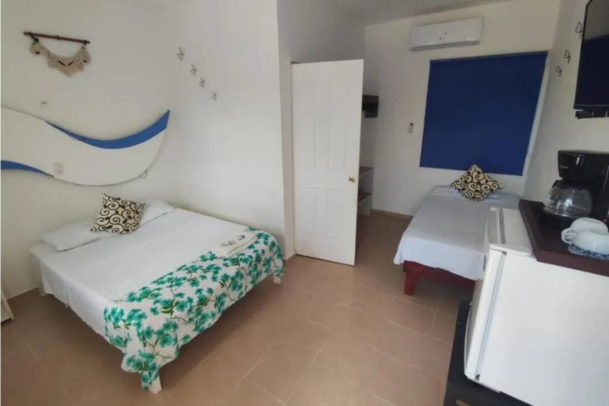 Basic Room, 2 Double Beds, Air conditioning, Courtyard View (Patio View) | Free WiFi
