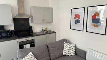 Studio, Non Smoking, Kitchen | Living area | Flat-screen TV
