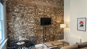 Apartment, 1 Double Bed with Sofa bed, Non Smoking, Kitchen | Living area | Flat-screen TV