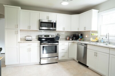 Best of both worlds! Stylish home minutes from Downtown with all the amenities!