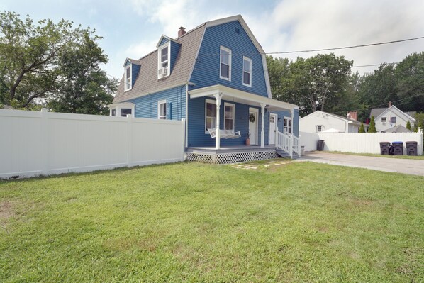 A two-story house with a porch and a white fence. - Beautiful Modern Beach House In Old Orchard Beach! w/ optional In-Law Apartment! (Old Orchard Beach)