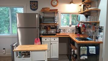 Fridge, microwave, cookware/dishes/utensils