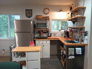 Fridge, microwave, cookware/dishes/utensils
