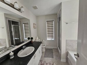 Hair dryer, towels, soap, shampoo