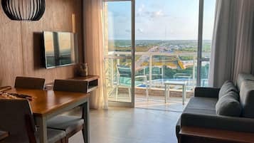 Comfort Apartment, Balcony, Garden View | Living area | Flat-screen TV
