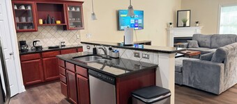 Spacious townhome ideally located in Grayson with private backyard. Sleeps 8