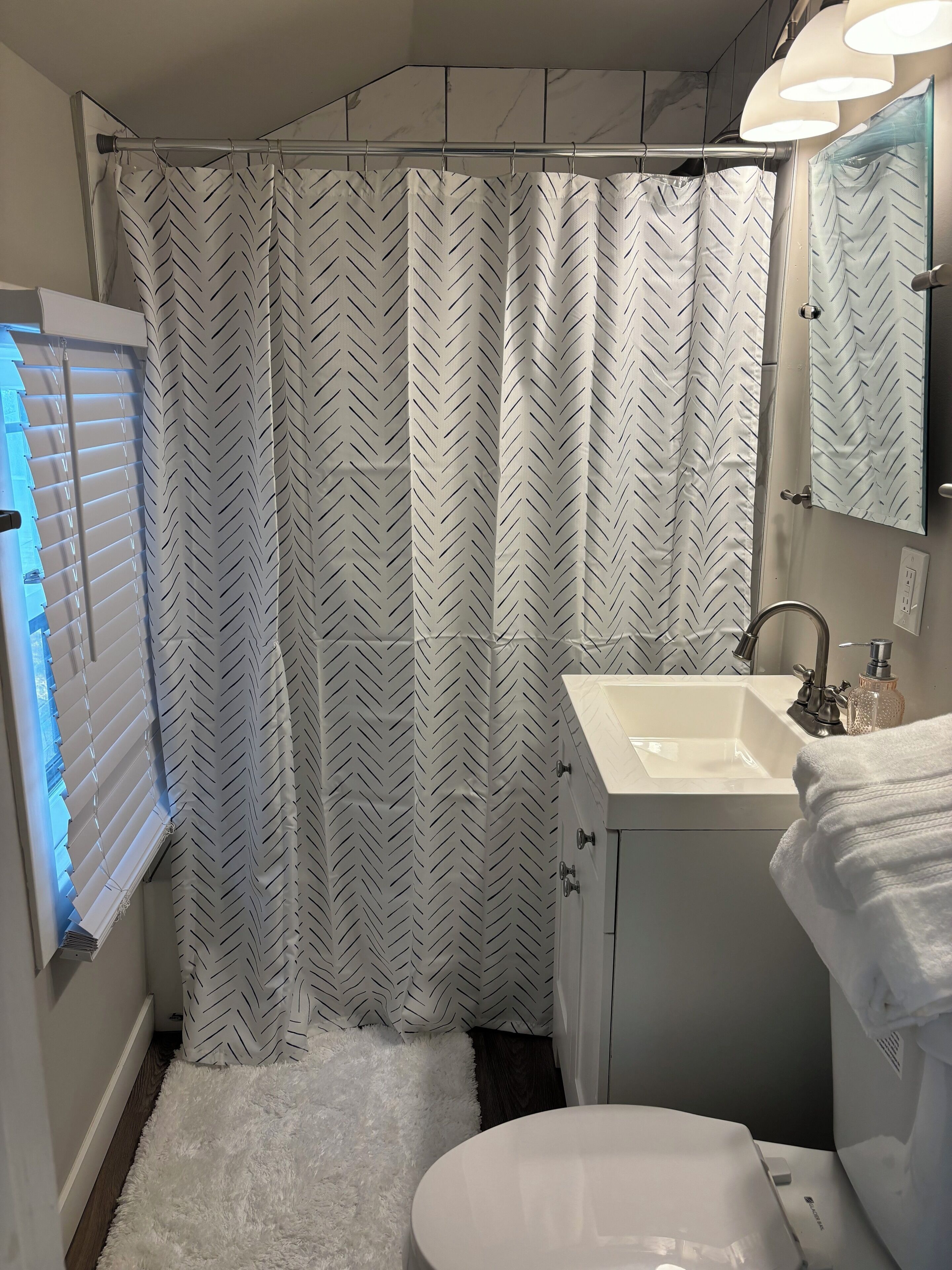 Hair dryer, towels, soap, shampoo