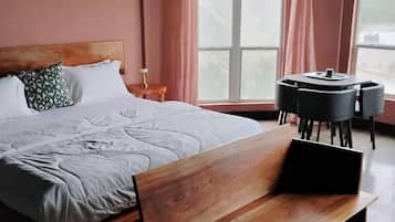 Desk, laptop workspace, free WiFi, bed sheets