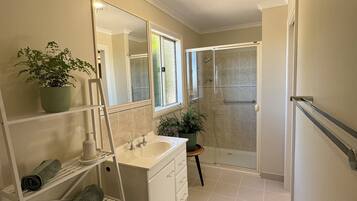 Shower, towels, soap, toilet paper