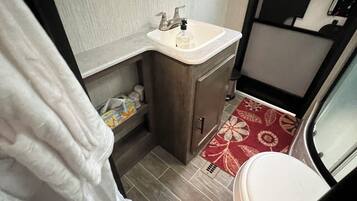 Hair dryer, towels, soap, toilet paper