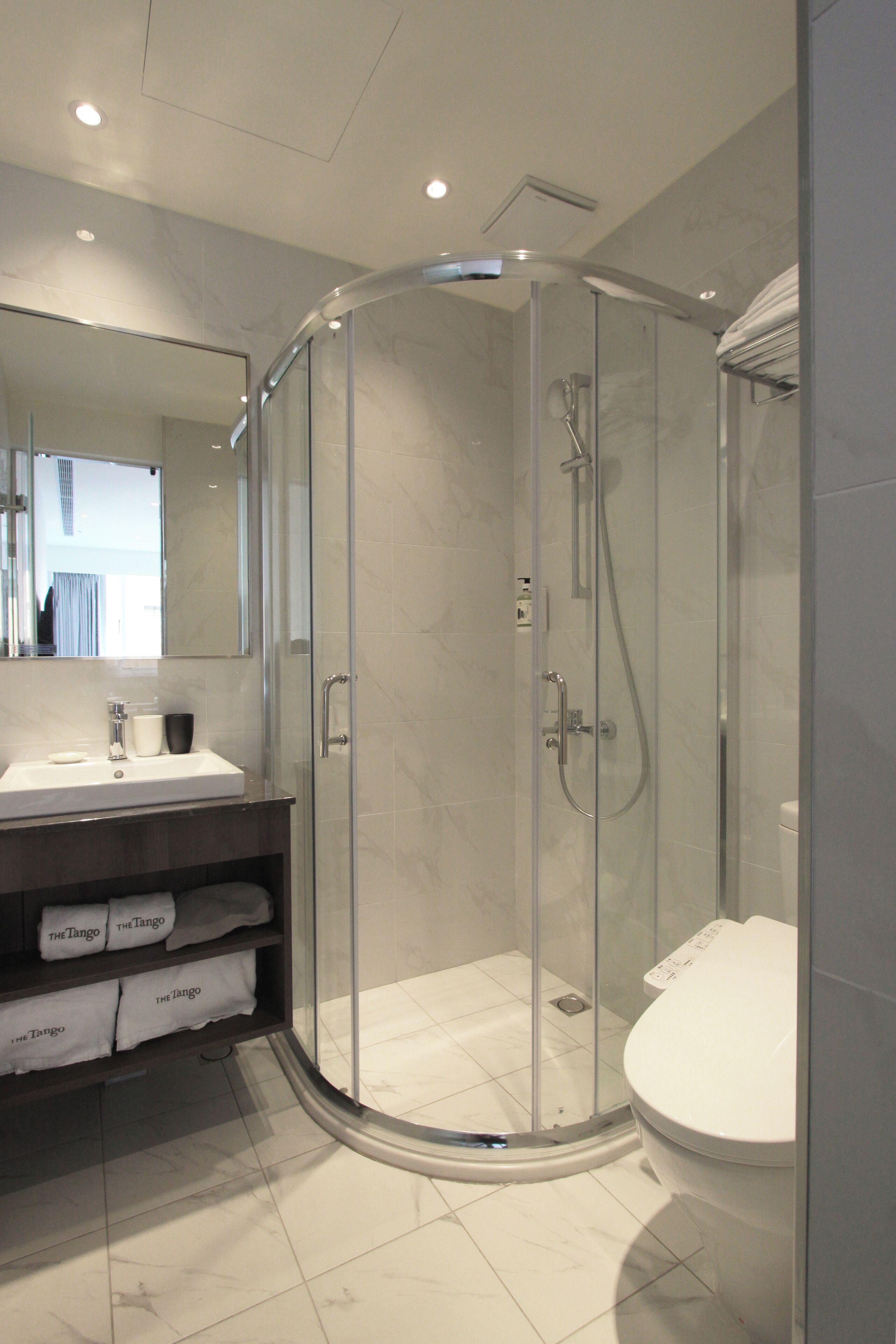 Shower, eco-friendly toiletries, hair dryer, towels