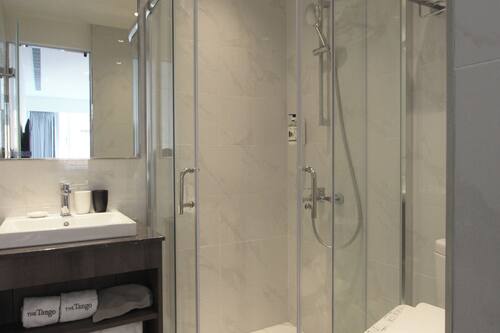 Shower, eco-friendly toiletries, hair dryer, towels