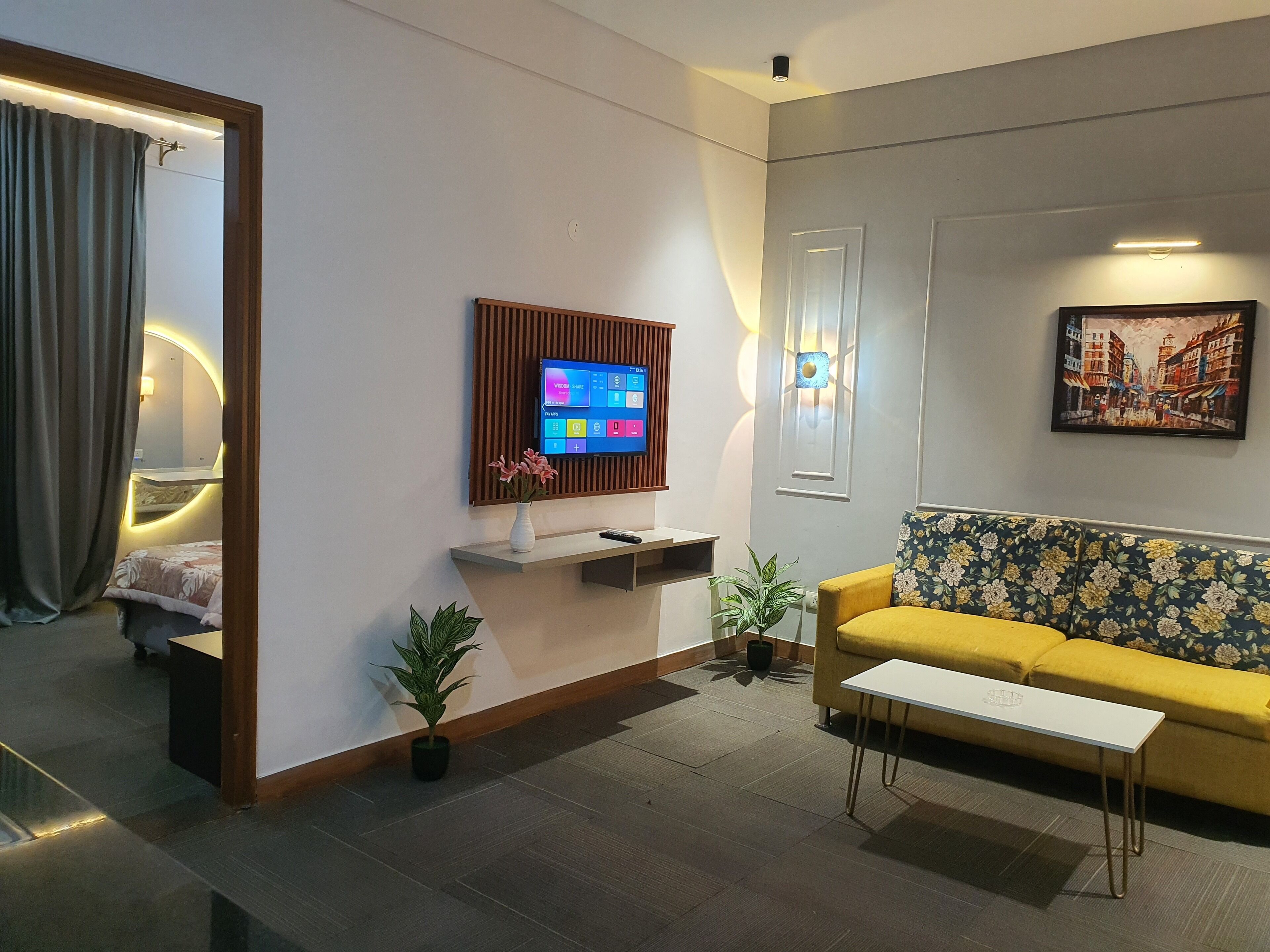 Luxury Studio Suite, City View | Living area | TV, printers