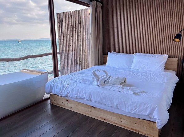 Habitación doble Deluxe, vista al océano | Wifi gratis y ropa de cama 