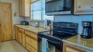 Fridge, microwave, oven, stovetop - Charming Beachfront Cottage with Stunning Ocean Views (Galveston)