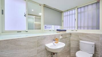 Hair dryer, towels, soap, shampoo