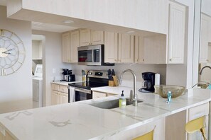 Fridge, microwave, dishwasher, coffee/tea maker