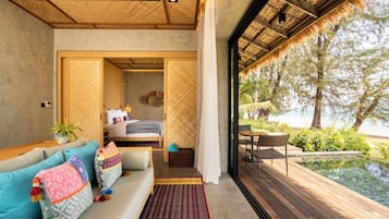 Beachfront Pool Villa | Living area | 44-inch flat-screen TV with cable channels