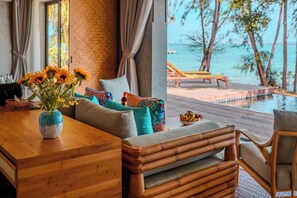 Two Bedroom Beachfront Pool Villa | Living area | 44-inch flat-screen TV with cable channels - JATI Koh Russey (Prey Nob)