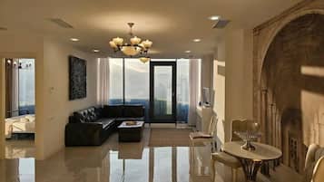 Business Apartment, City View | Living area | 42-inch LCD TV with digital channels