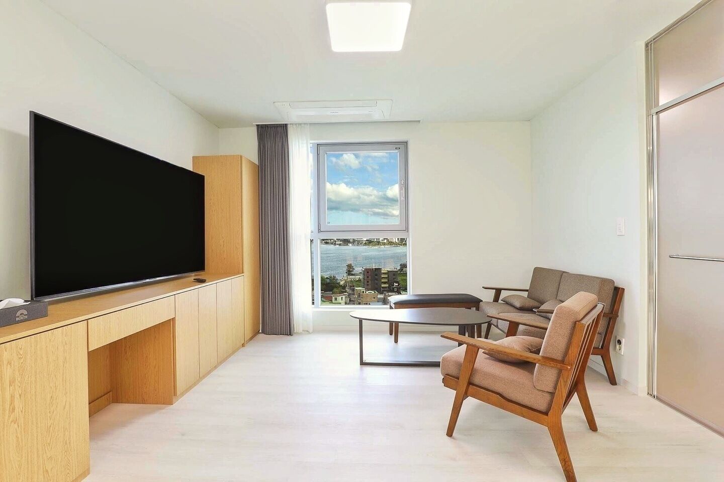 Penthouse, Sea View | Living area | 65-inch Smart TV with cable channels, Netflix, toys