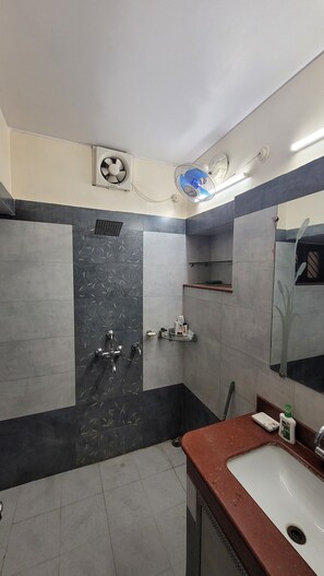 Shower, towels, soap, shampoo