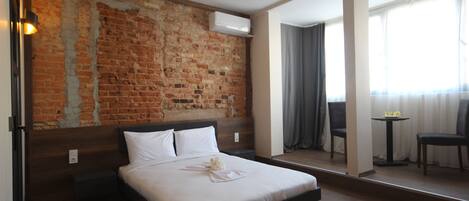 Ropa de cama de alta calidad y minibar