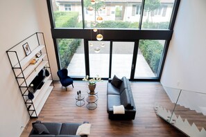 2 Bedroom Suite | Living area | 40-inch flat-screen TV with satellite channels