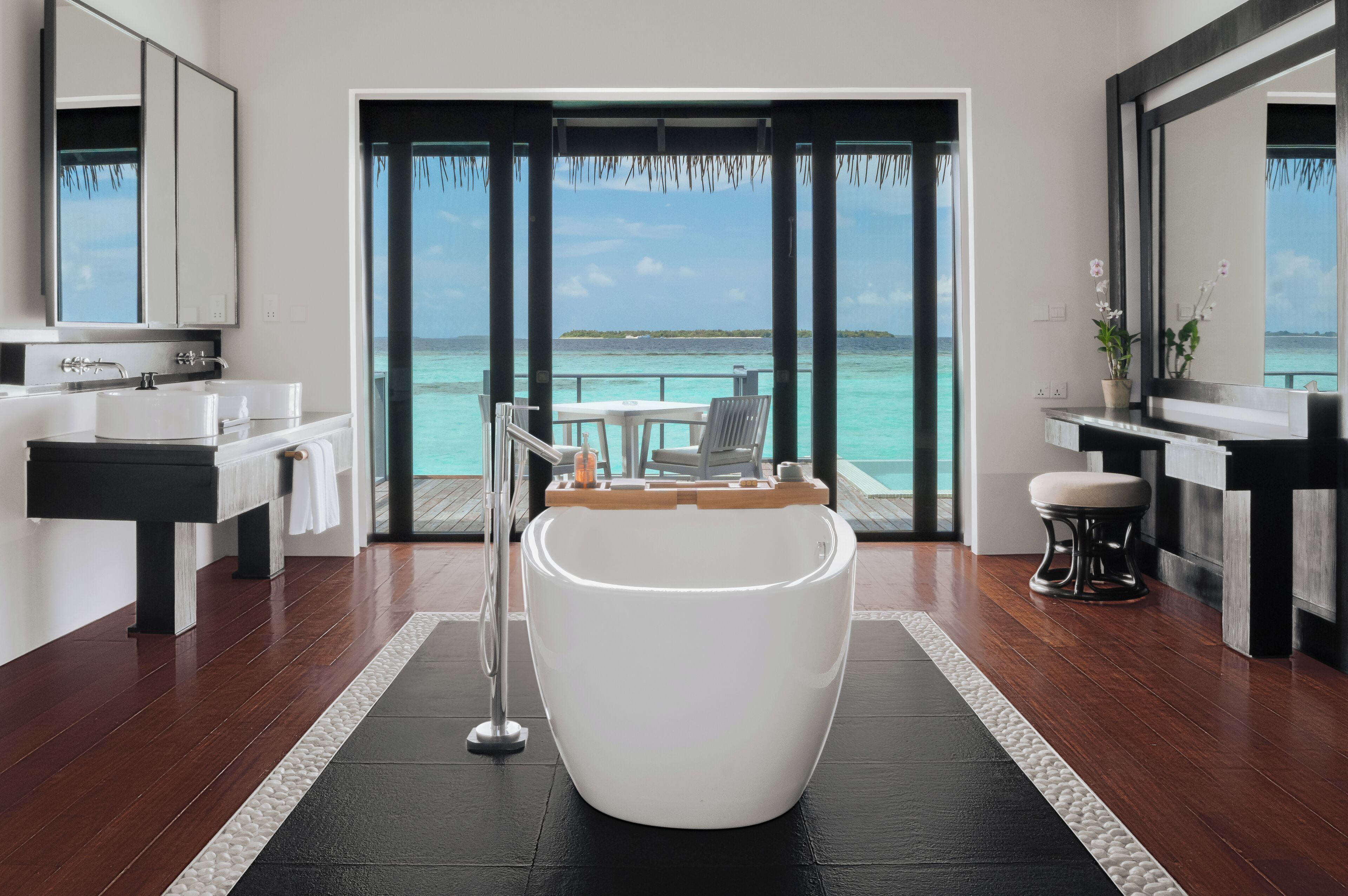 Separate bathtub and shower, rainfall showerhead, hair dryer, bathrobes