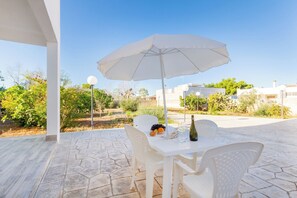 House, 3 Bedrooms, Smoking, Balcony | Outdoor dining - Porto Cesareo Air-conditioned Villa 12 Beds Torre Cesarea (Porto Cesareo)