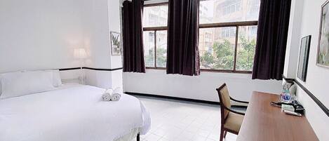 Habitación doble Deluxe, vista a la ciudad | Wifi gratis y ropa de cama