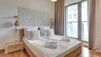 Apartament familiar | 1 dormitori, roba de llit hipoal·lergògena i decoració individual