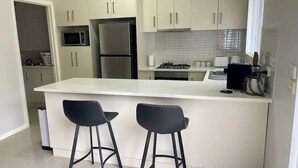 Unclassified image, 5 of 38, button - Discover urban living in our contemporary townhouse! (Wagga Wagga)