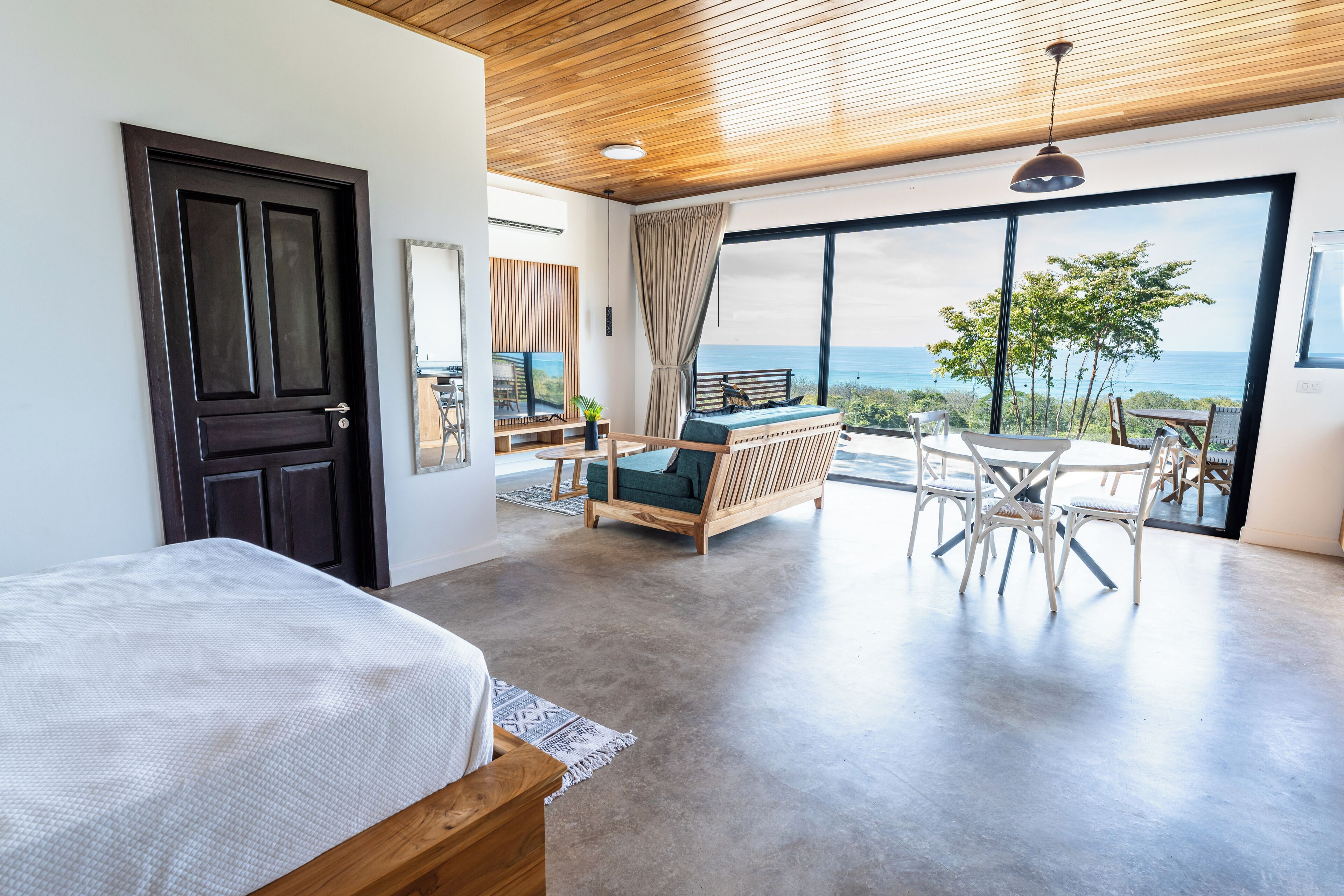 Ocean View Paradise Honeymoon Suite by Sea N' Rent | Living area | 40-inch Smart TV with cable channels