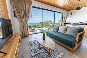 Ocean View Paradise Honeymoon Suite by Sea N' Rent | Living area | 40-inch Smart TV with cable channels - Sea View Paradise Retreat by Sea N' Rent (Cóbano)