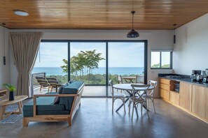 Ocean View Paradise Honeymoon Suite by Sea N' Rent | Living area | 40-inch Smart TV with cable channels - Sea View Paradise Retreat by Sea N' Rent (Cóbano)