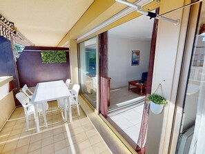Enjoy a cozy living space with a separate dining area and balcony.