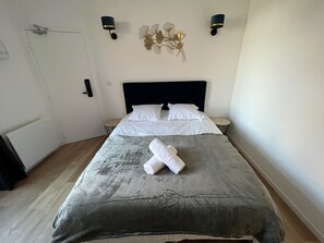 Iron/ironing board, free WiFi, bed sheets