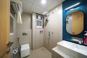 Standard Double Room | Bathroom | Shower, free toiletries, towels, soap - Olive Baner by Embassy Group (Pune)