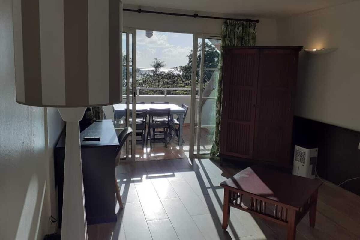 Comfort Apartment, Balcony, Sea View | Living area | Flat-screen TV