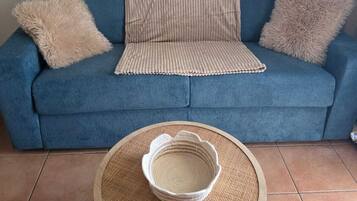 Comfort Apartment, 1 Bedroom, Roll-in Shower | Living area | Flat-screen TV