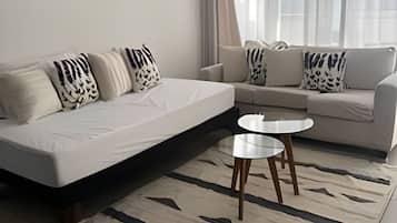 Apartment | Living area | 32-inch Smart TV with digital channels, Netflix, streaming services