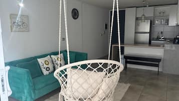 Chic San Isidro Apartment | Living area | 32-inch Smart TV with digital channels, streaming services